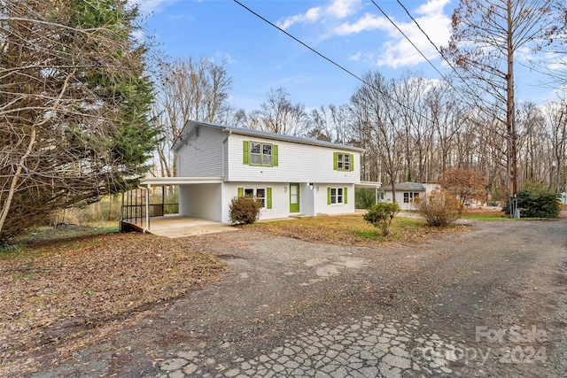 view of property featuring a carport