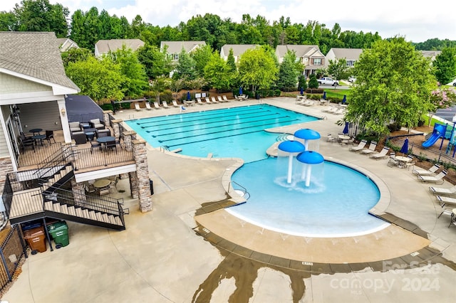 view of pool featuring a patio area