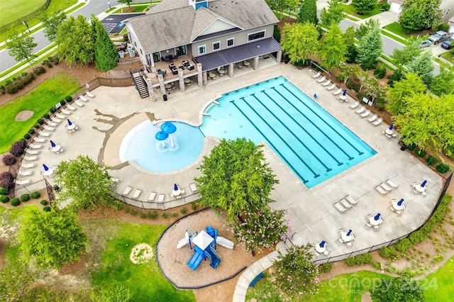 view of swimming pool featuring a patio area