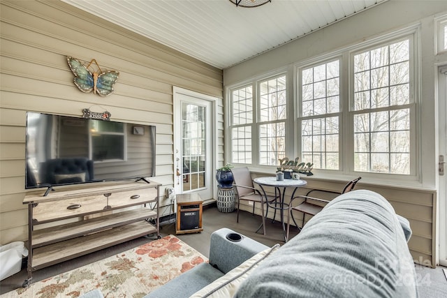 sunroom featuring wooden ceiling