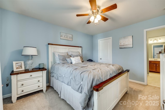 bedroom featuring a ceiling fan, light colored carpet, and baseboards