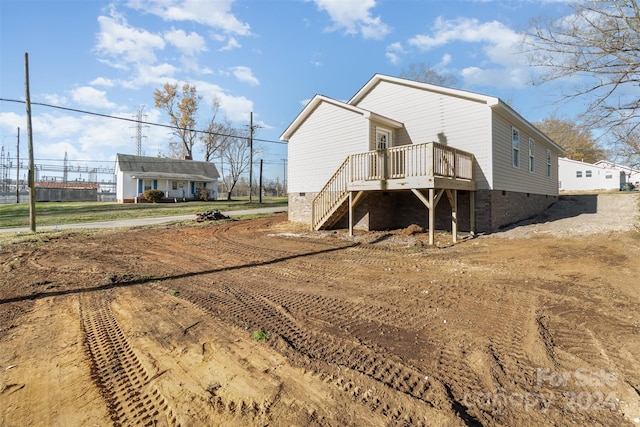 exterior space with a wooden deck