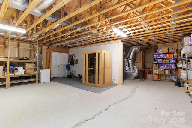 basement featuring refrigerator