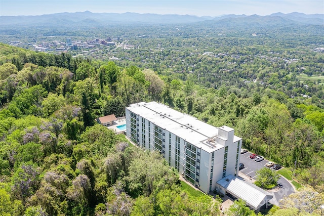 birds eye view of property with a mountain view