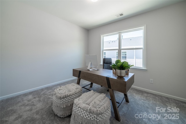 office area featuring visible vents, carpet floors, and baseboards