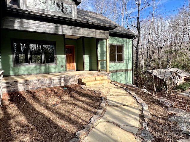 entrance to property with covered porch