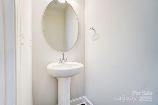 bathroom featuring baseboards