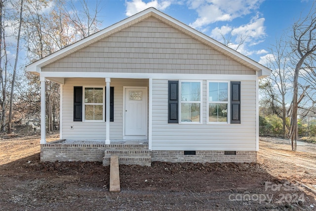 bungalow-style home featuring covered porch