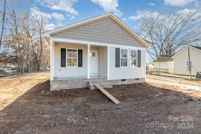 bungalow-style home with a porch