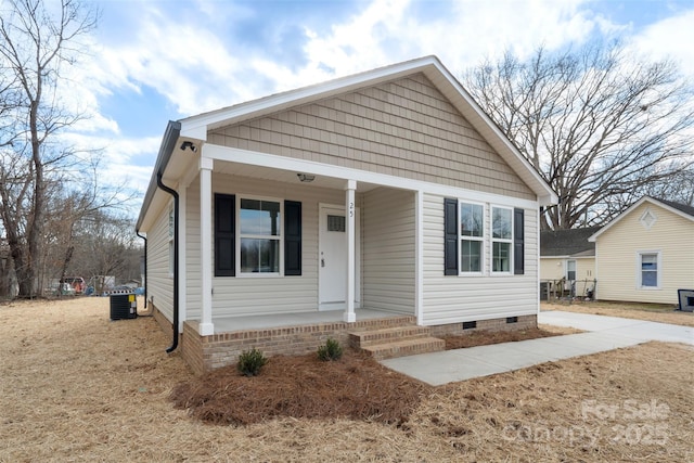 view of front of house featuring central AC and covered porch