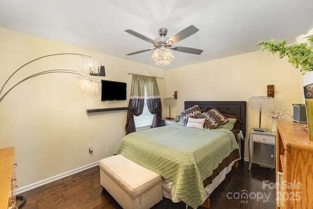 bedroom with dark wood finished floors, baseboards, and ceiling fan