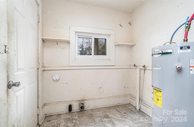 utility room with water heater