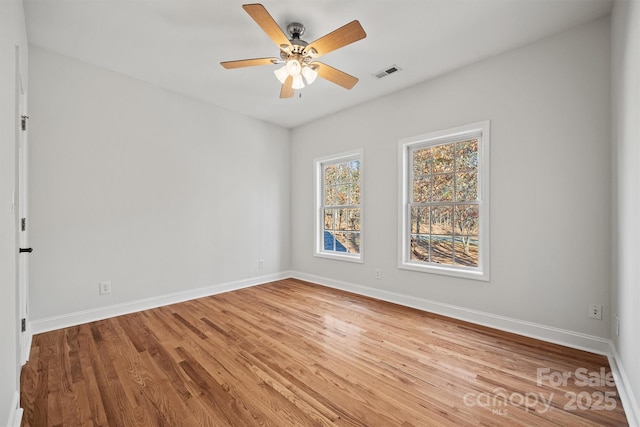 unfurnished room featuring ceiling fan and light hardwood / wood-style flooring