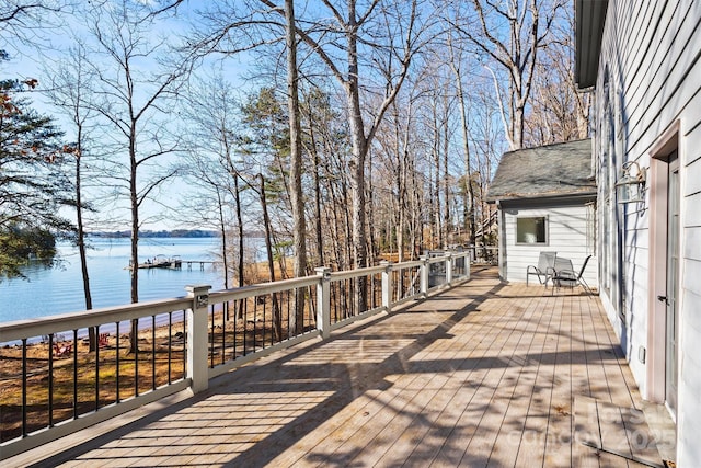 deck featuring a water view