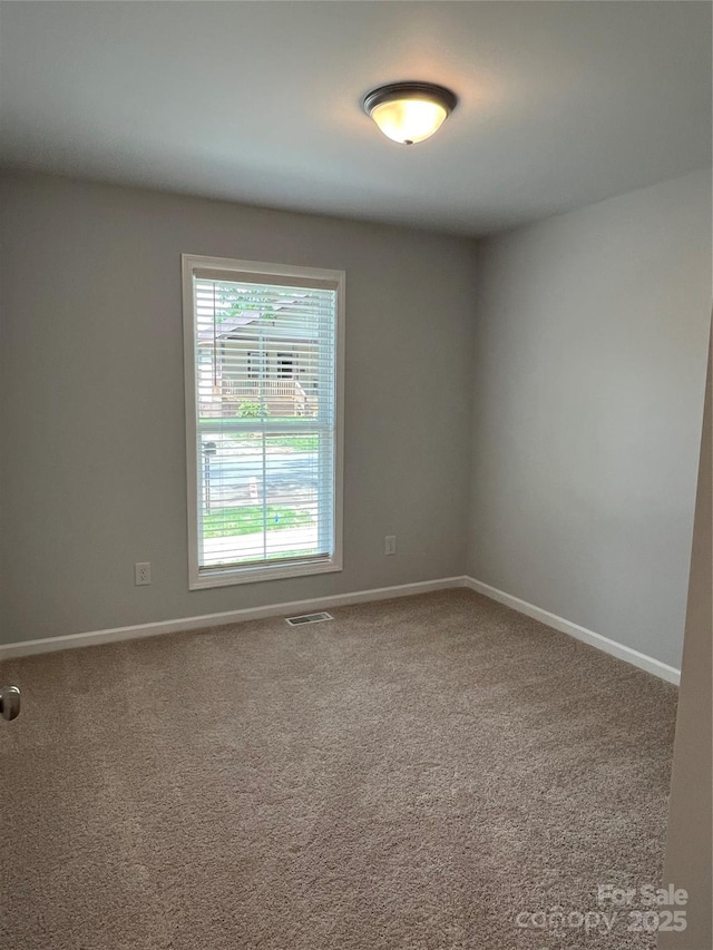 718 Park Ave, Salisbury, NC 28144 - carpeted empty room featuring baseboards
