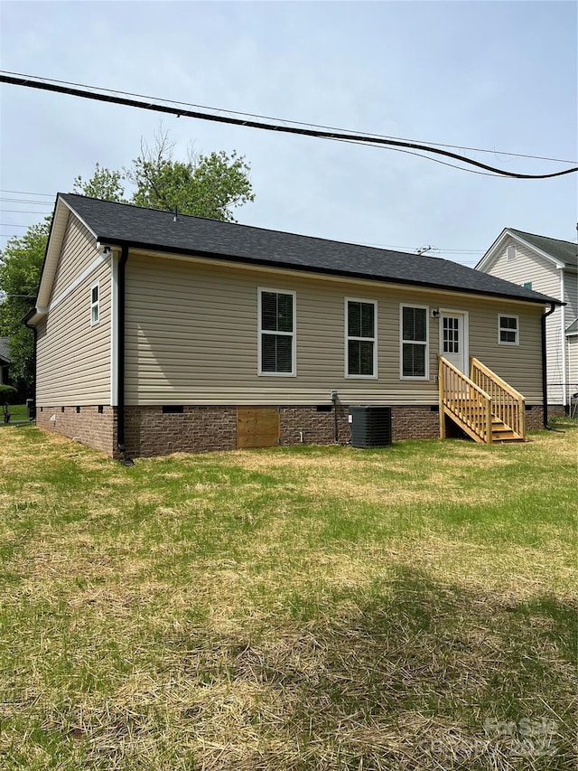 718 Park Ave, Salisbury, NC 28144 - back of house with crawl space, cooling unit, a lawn, and roof with shingles