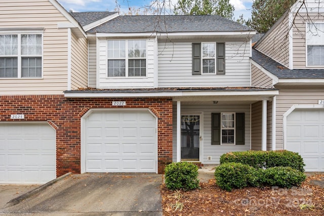 view of front of property featuring a garage