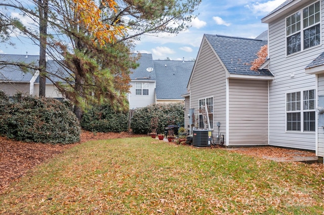 view of yard with central AC unit