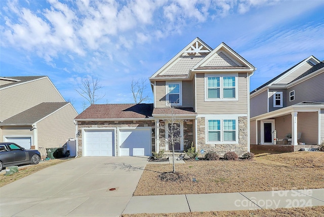 view of front of property with a garage