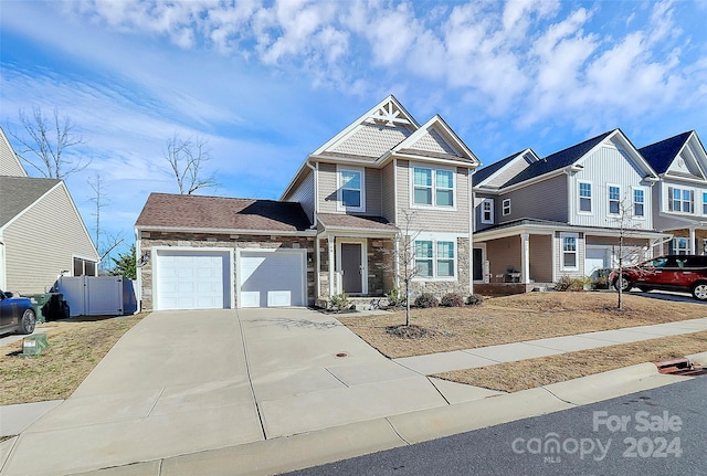 view of front of property with a garage