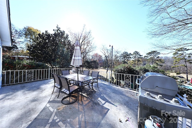 view of patio / terrace featuring a mountain view and grilling area