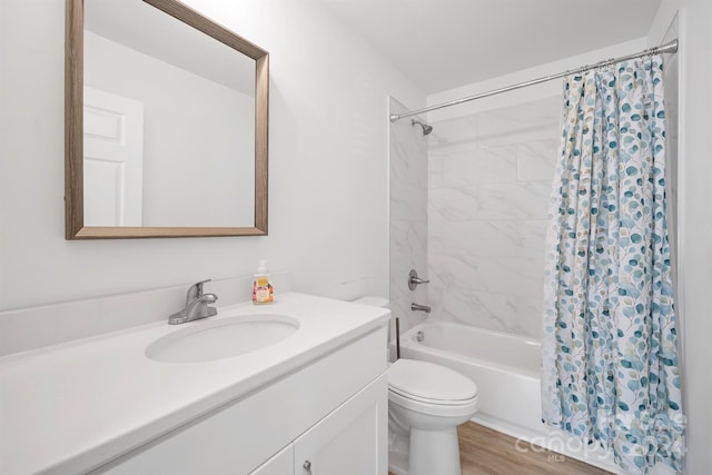 full bathroom with vanity, hardwood / wood-style floors, shower / bathtub combination with curtain, and toilet