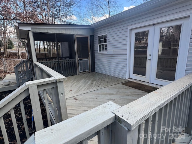 wooden deck featuring french doors