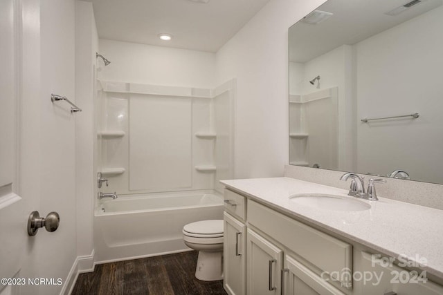 full bathroom featuring shower / bath combination, vanity, toilet, and wood-type flooring