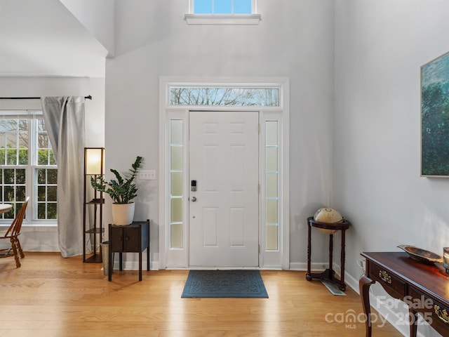 entrance foyer with light hardwood / wood-style floors