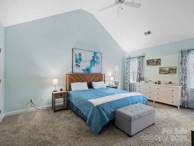 bedroom with lofted ceiling, ceiling fan, and carpet