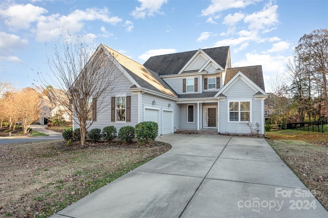 view of front of property with a garage