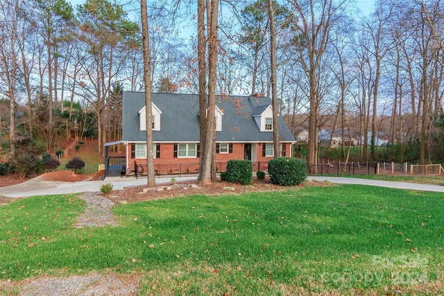 view of side of home featuring a yard