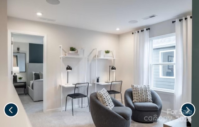 living area featuring recessed lighting, carpet, visible vents, and baseboards