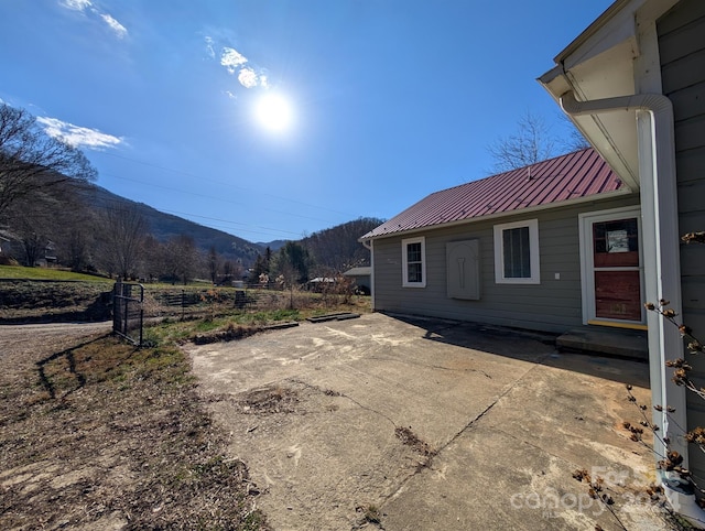 view of patio / terrace featuring a mountain view