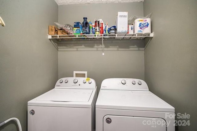 laundry area with washer and dryer