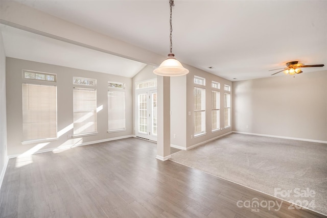 12039 Windy Rock Way, Charlotte, NC 28273 - unfurnished room with hardwood / wood-style floors, ceiling fan, and vaulted ceiling with beams