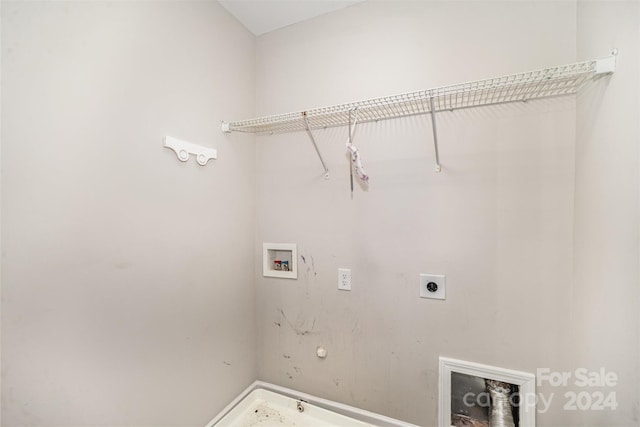 12039 Windy Rock Way, Charlotte, NC 28273 - laundry area featuring electric dryer hookup, gas dryer hookup, and hookup for a washing machine