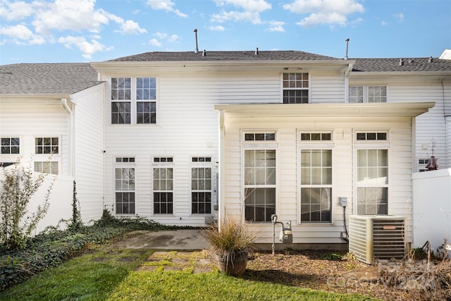 12039 Windy Rock Way, Charlotte, NC 28273 - back of house featuring cooling unit and a patio