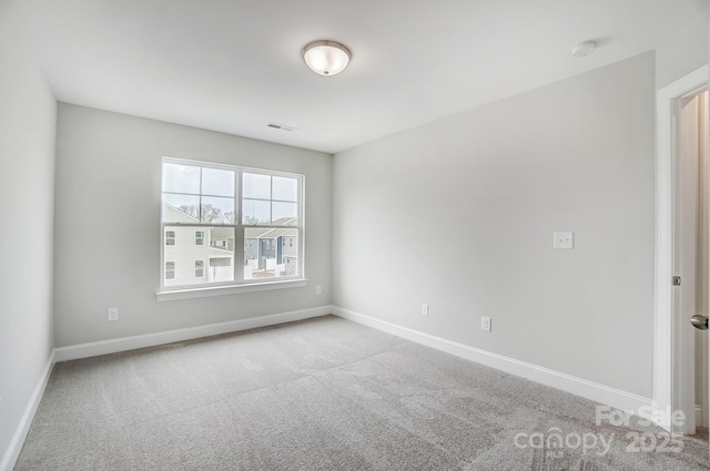 view of carpeted spare room