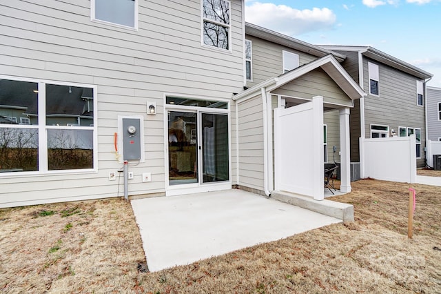 rear view of property featuring a patio