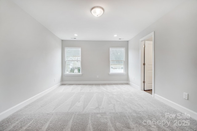 view of carpeted spare room