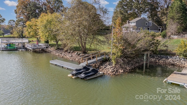 view of dock with a water view