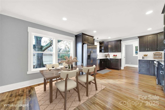 dining room featuring light hardwood / wood-style flooring