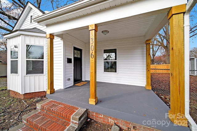 property entrance with a porch