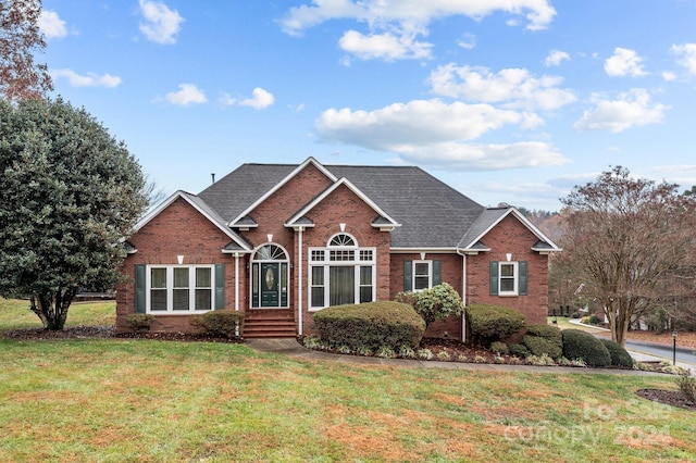 view of front of house with a front lawn