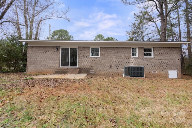 back of property with central air condition unit