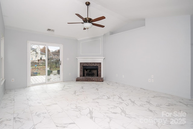 unfurnished living room featuring vaulted ceiling with beams, a brick fireplace, and ceiling fan