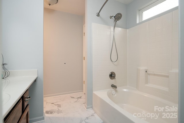 bathroom with vanity and shower / bath combination