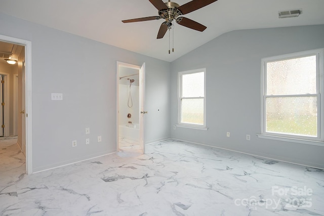 unfurnished bedroom featuring ceiling fan and lofted ceiling