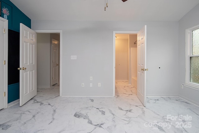 unfurnished bedroom with ceiling fan